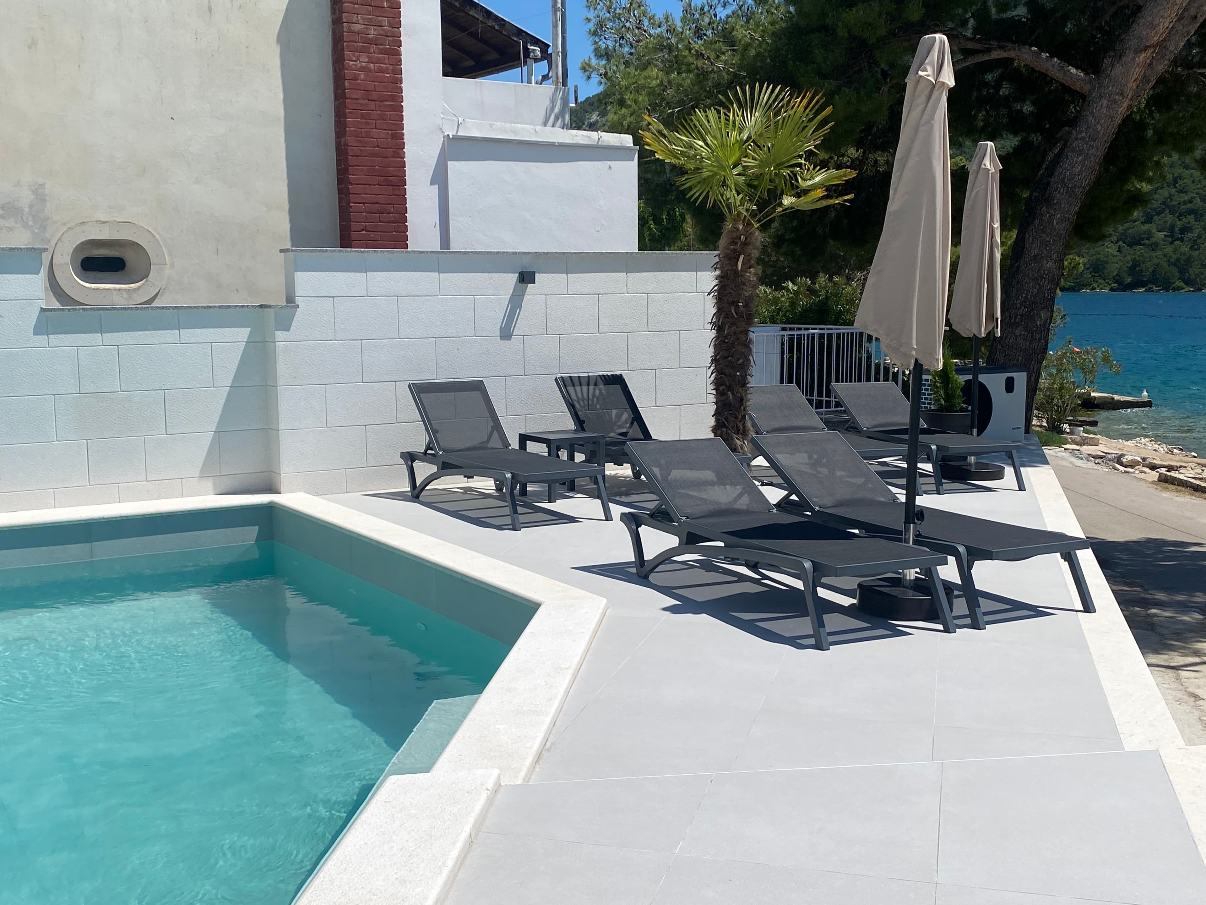 Swimming pool at White Pearl Apartments